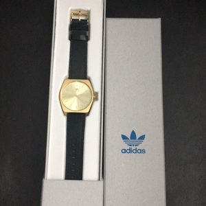 Adidas gold and black watch